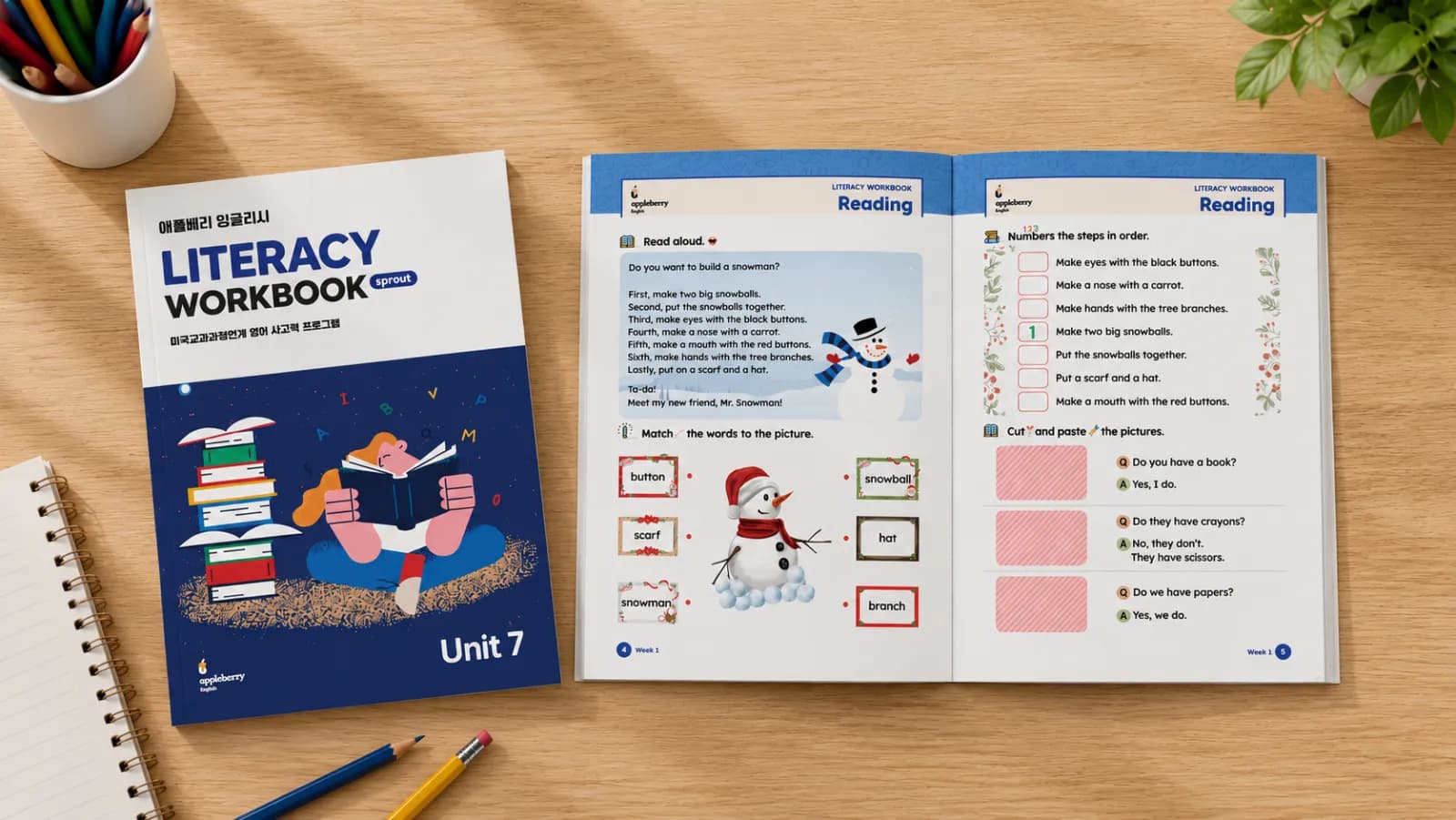 애플베리 잉글리시 Literacy Workbook 표지와 Reading 지면 목업입니다.